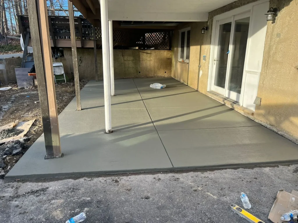 An open concrete patio ready to be decorated.